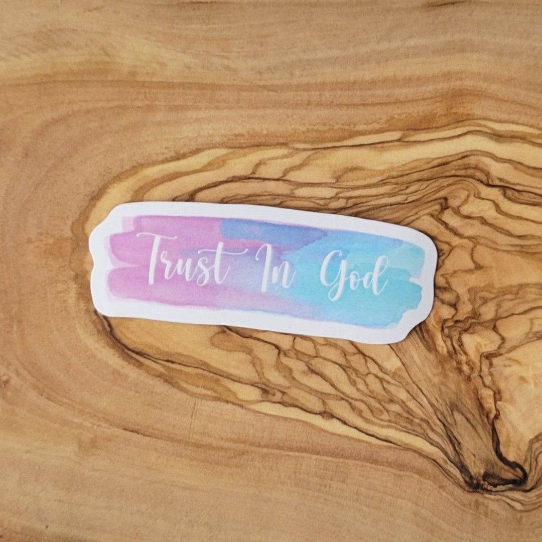 A paint stroke in purple and blue, with Trust in God