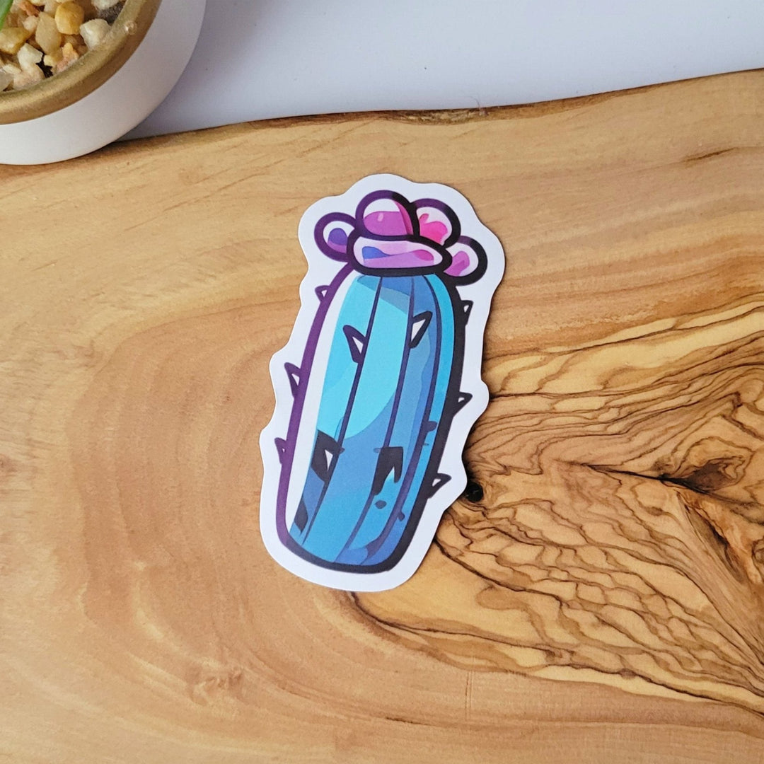 A blue and purple cactus sticker with a cartoon style
