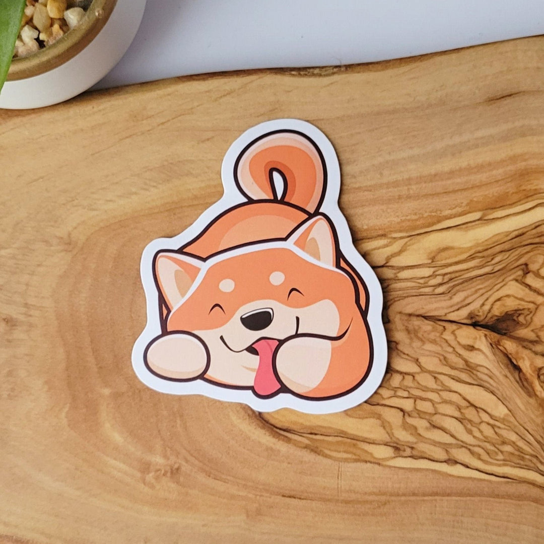 a happy tan and orange dog licking it's paw