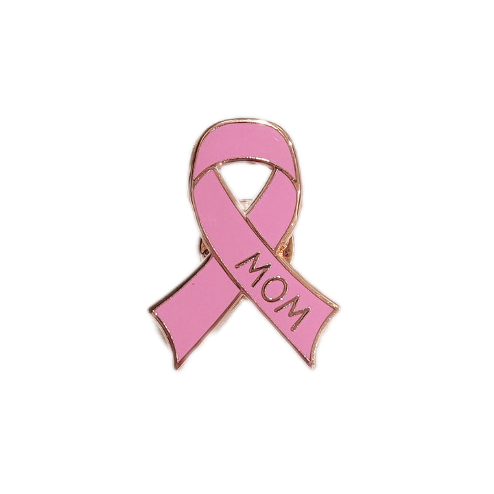 pink cancer ribbon shaped pin on white background